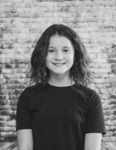 Azlyn G.